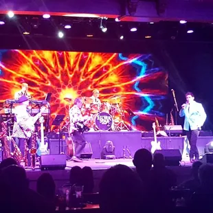 a band performing on stage