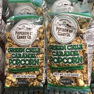 two bags of green chile caramel popcorn