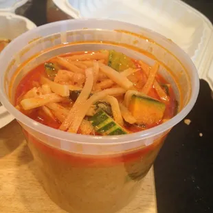 Pumpkin red curry to go. Really good.