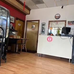 inside of a restaurant with wooden floors