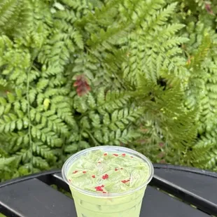 Iced Matcha latte with valentines topping