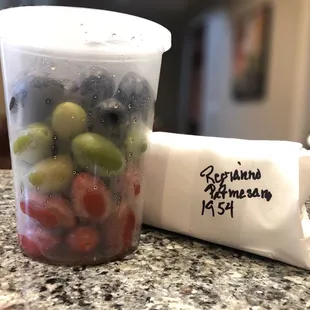 Olives and some of the better parmigiana reggiano in the city.