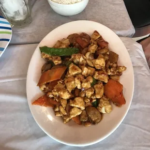 a plate of stir fried vegetables