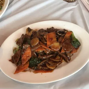 a plate of stir fried vegetables