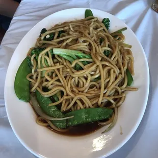 a plate of noodles and vegetables