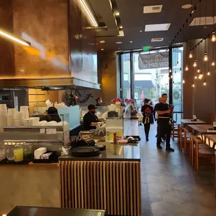 Partial view of the dining room and kitchen preparation area