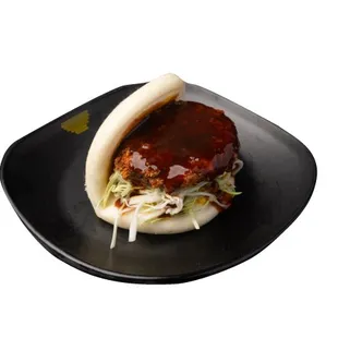 Impossible Bun - Impossible meat breaded with panko, deep fried, with shredded cabbage and katsu sauce - you won&apos;t miss meat!