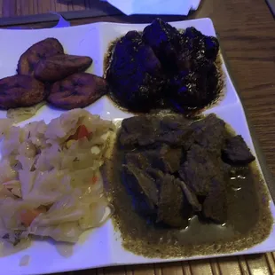 Oxtail and Curry Goat Combo Dinner