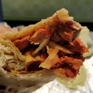 Chicken tikka or tandoori, I forget. Just well cooked, moist. Generous amount of chicken w a touch of onions.
