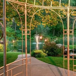 Beautiful gazebo and pond with water feature.