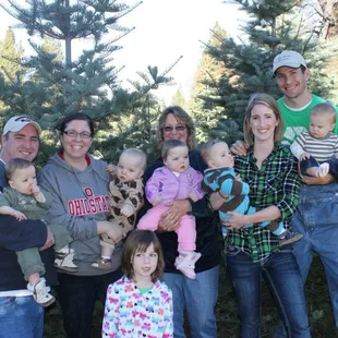 A big family that visits every year to pick out their tree.