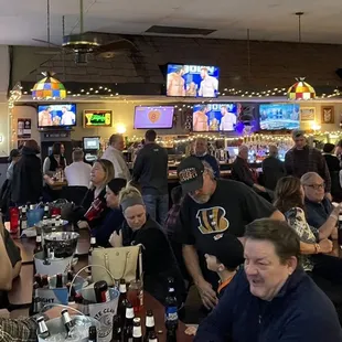 a large group of people sitting at tables