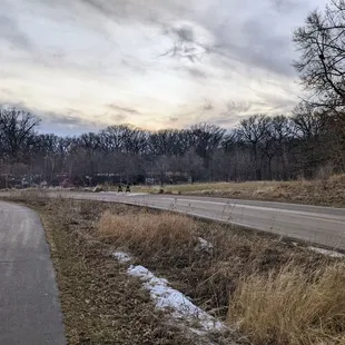 Heading into the park near sunset: walking and driving paths