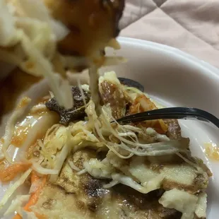 a plate of food with a fork