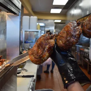 a person holding a large knife