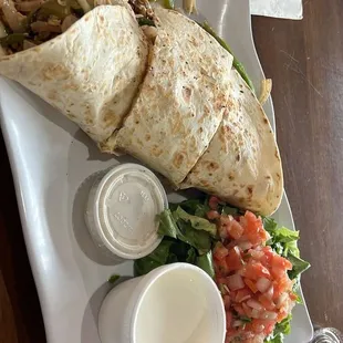 The Chicken quesadilla it's was so good . I highly recommend their food . It's one of my favorite spots to get lunch.