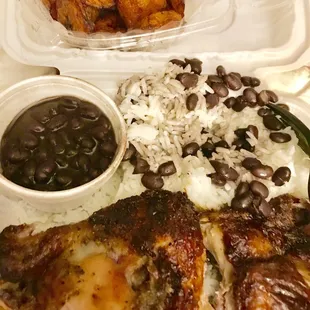 Roasted chicken, black beans, white rice and plantains