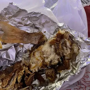 a grilled fish in foil
