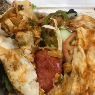 a white styrofoam container filled with food