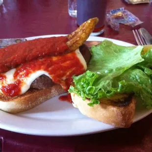 Sausage patty and grilled pepper sandwich.