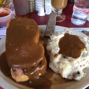 Hot roast beef with the best Italian bread ever. Mashed potatoes are not always available but gravy on the fries is yummy too.
