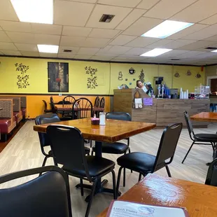 dining area with tables and chairs