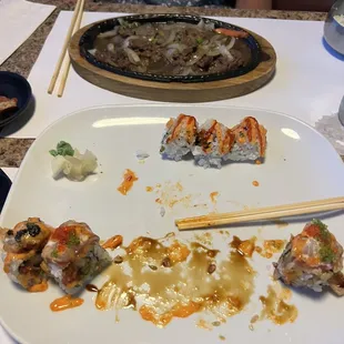 Fire mountain roll and spicy salmon roll or at least what&apos;s left of them