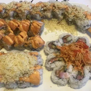 Top row: shrimp crunch roll, middle: Fuji roll (amazing), bottom left: spicy tuna crunch, bottom right: sunflower roll