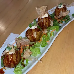 Takoyaki (fried octopus balls) from the appetizer menu