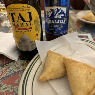 The samosa, front of our beers