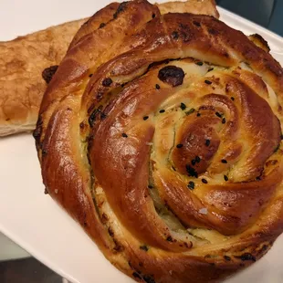 Both the gül börek, a brioche-like roll, and börek, a flaky pastry, were filled with spinach.
