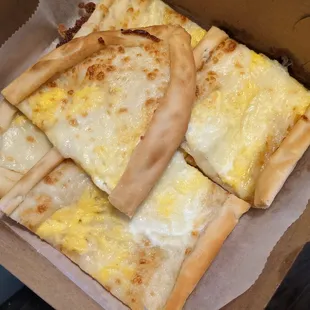 Large, chewy thin-crust egg and cheese pide was freshly made.
