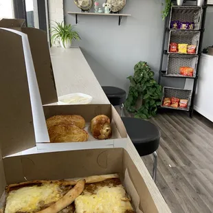 Meat, egg &amp; cheese pide, two potato pogaca &amp; one dill pogaca as well as a cheese crispy borek.
