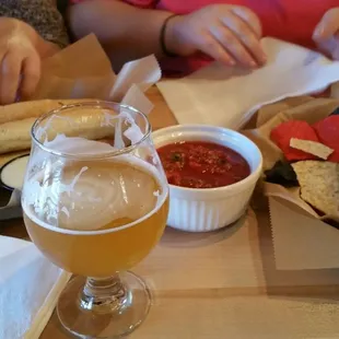 Chips and salsa, beer and garlic bread