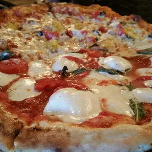 Half veggie and half Margarita pizza. Very good.