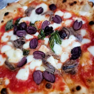 Acciughe E Olive Nere (Margherita with olives and anchovies.) Salty and tasty