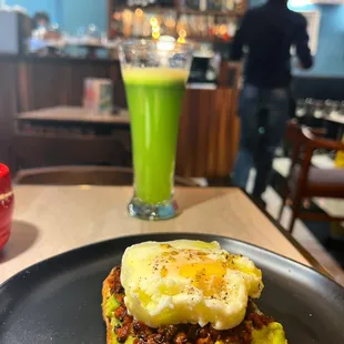 Avocado toast with soy chorizo. &quot;The Chelsea&quot; is a green juice with apple, celery, cucumber and lime.