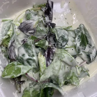 Side salad with ranch $3 (04/21)  Showcasing the choice of lettuce. Also with one cucumber, two white onions, and two dressings.