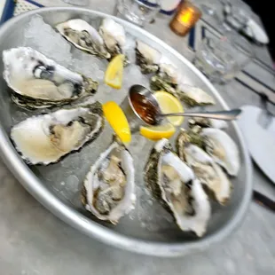 Oysters (sorry for the blur)  $3 ea. happy hour.