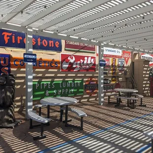 Assorted antique signs outside barn