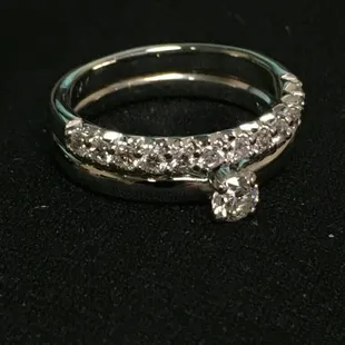 Beautiful wedding ring welded on top of an engagement ring.
