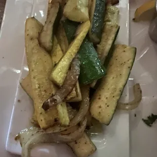 Zucchini, squash and onions. Nicely caramelized in butter and spices. Delicious!.