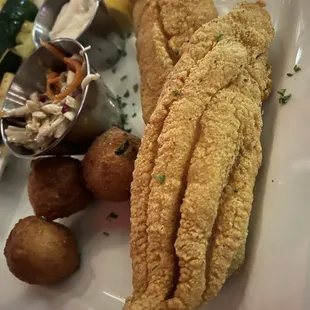 fried fish and vegetables on a plate