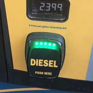 a diesel pump with a green light