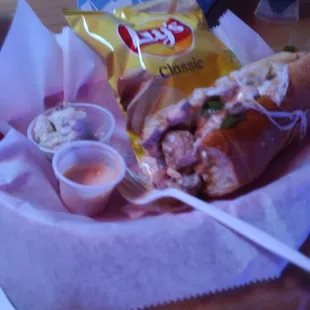 a bag of chips and a sandwich