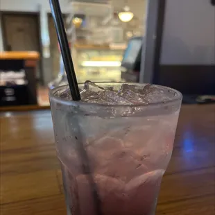 a drink with ice and a straw