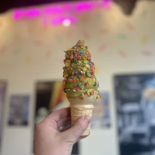 an ice cream cone with sprinkles