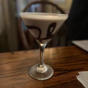 a drink in a martini glass