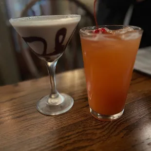 two cocktails on a table