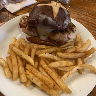 Grilled Chicken Sandwich with Bacon and Cheese added on with a side of SUPER crispy (delicious) fries! Chefs kiss! It's was amazing!!